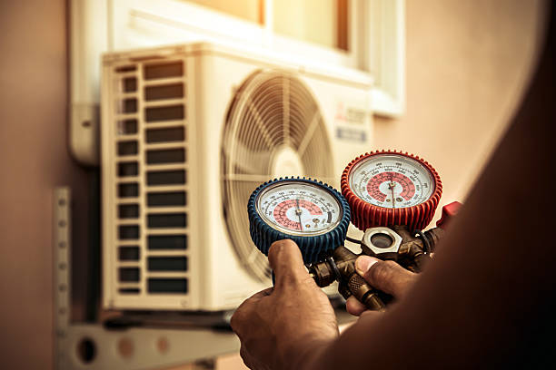 Professional Heat Pump Repair technician working in Rome City, IN